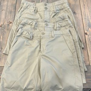 5 PAIR SET of boys Under Armor khaki golf dri fit shorts. Size XL.